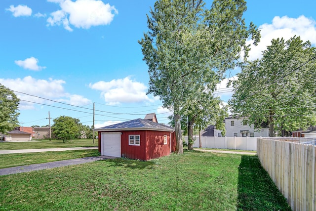 2621 Ridge Rd, Lansing, IL 60438 - view of yard featuring asphalt driveway and an outdoor structure