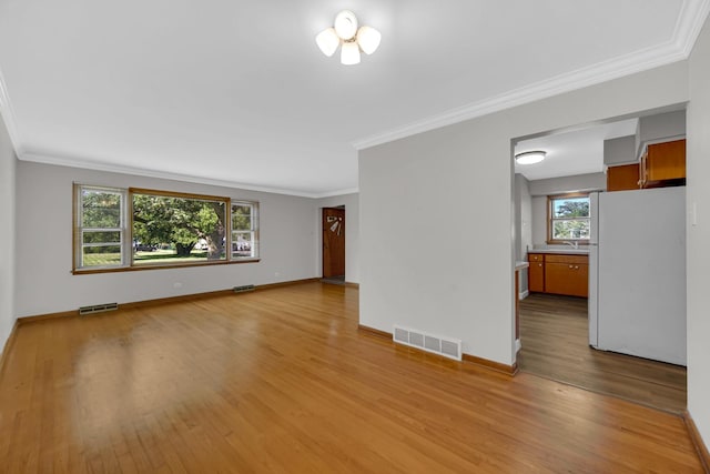 2621 Ridge Rd, Lansing, IL 60438 - unfurnished room featuring crown molding and wood finished floors