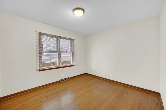 2621 Ridge Rd, Lansing, IL 60438 - unfurnished room featuring baseboards and wood finished floors
