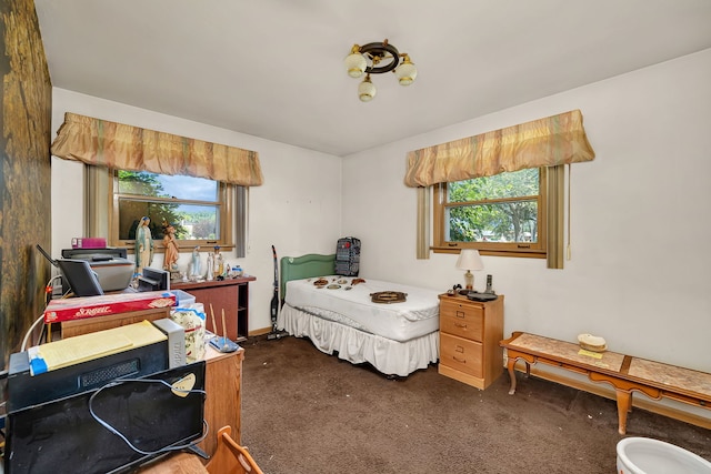 7859 78th St, Bridgeview, IL 60455 - bedroom featuring carpet flooring, multiple windows, and a desk