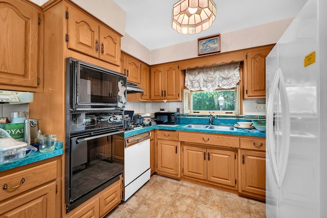 7859 78th St, Bridgeview, IL 60455 - kitchen with black appliances, brown cabinetry, tasteful backsplash, under cabinet range hood, and dark countertops