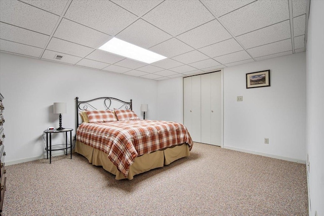 2210 Hedgewood Dr, Bloomington, IL 61704 - bedroom with carpet flooring, a drop ceiling, and a closet
