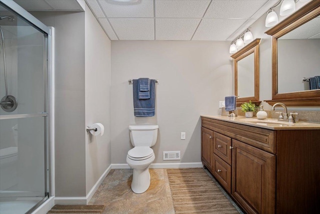 2210 Hedgewood Dr, Bloomington, IL 61704 - full bath with vanity, a drop ceiling, and a shower with door
