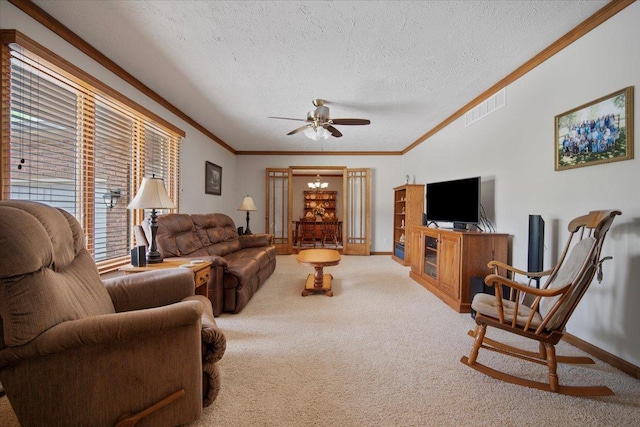 2210 Hedgewood Dr, Bloomington, IL 61704 - living room with ornamental molding, carpet, a ceiling fan, and a textured ceiling