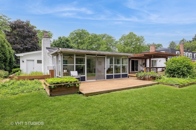 855 Beverly Pl, Lake Forest, IL 60045 - back of house with a chimney, a wooden deck, a sunroom, and a yard