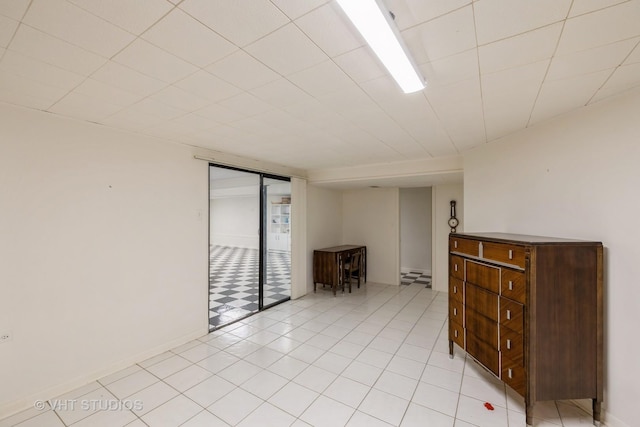855 Beverly Pl, Lake Forest, IL 60045 - unfurnished room featuring baseboards and light tile patterned flooring