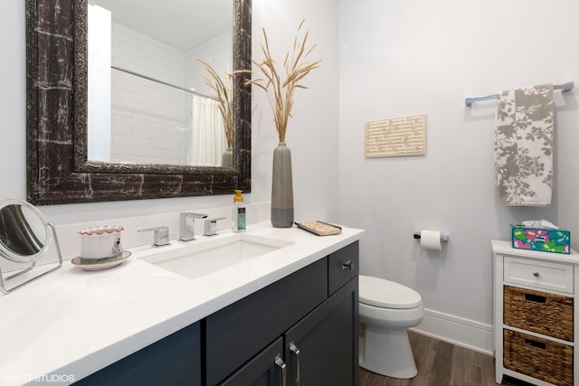 5748 N Hermitage Ave Unit 406, Chicago, IL 60660 - bathroom with vanity, wood finished floors, and curtained shower