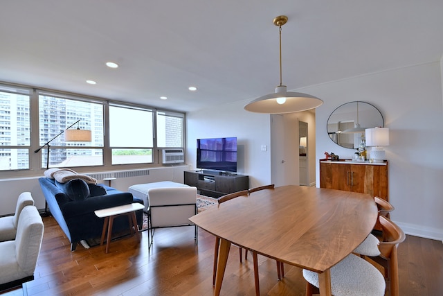 3950 N Lake Shore Dr Unit 810B, Chicago, IL 60613 - dining room featuring wood finished floors, recessed lighting, cooling unit, and radiator heating unit