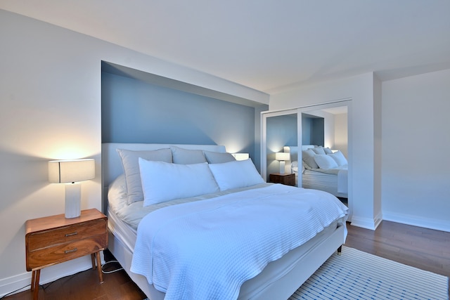 3950 N Lake Shore Dr Unit 810B, Chicago, IL 60613 - bedroom featuring wood finished floors and baseboards