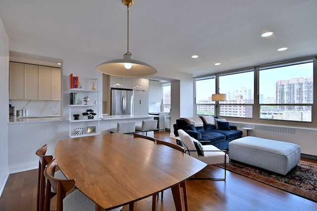3950 N Lake Shore Dr Unit 810B, Chicago, IL 60613 - dining area with dark wood finished floors, recessed lighting, and a view of city