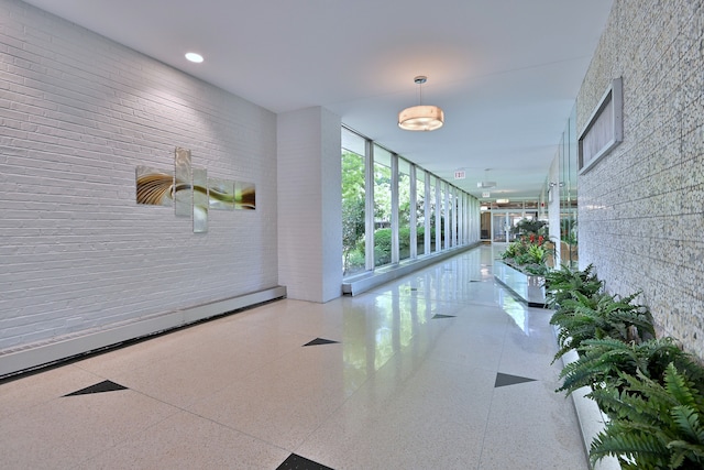 3950 N Lake Shore Dr Unit 810B, Chicago, IL 60613 - corridor featuring a baseboard radiator and recessed lighting