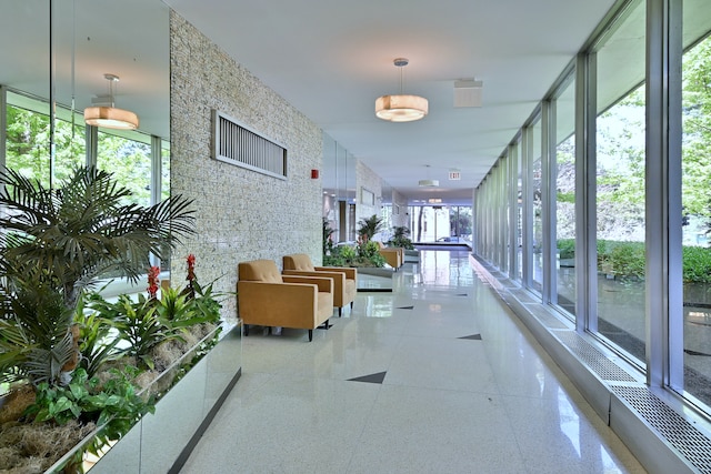 3950 N Lake Shore Dr Unit 810B, Chicago, IL 60613 - common area featuring a wall of windows
