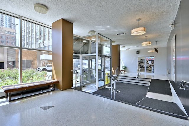 3950 N Lake Shore Dr Unit 810B, Chicago, IL 60613 - lobby with a wall of windows and a textured ceiling