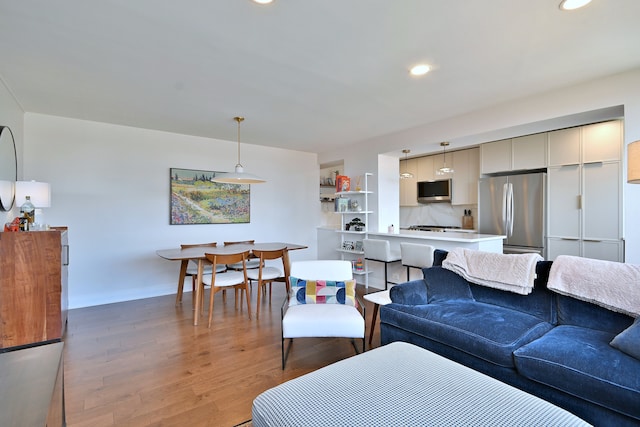 3950 N Lake Shore Dr Unit 810B, Chicago, IL 60613 - living room with light wood finished floors and recessed lighting