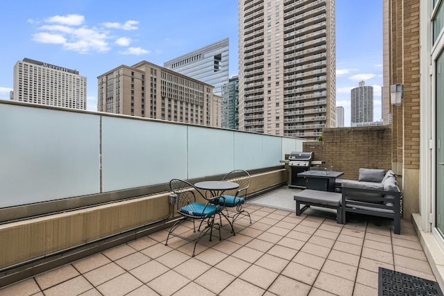 33 W Ontario St Unit Th5, Chicago, IL 60654 - view of patio with area for grilling and a view of city