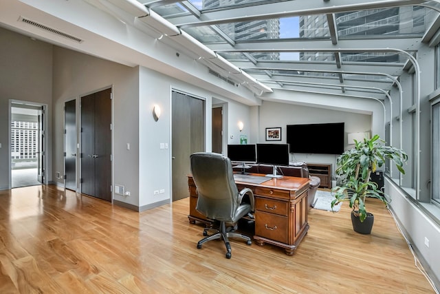 33 W Ontario St Unit Th5, Chicago, IL 60654 - home office with light wood-style flooring and baseboards