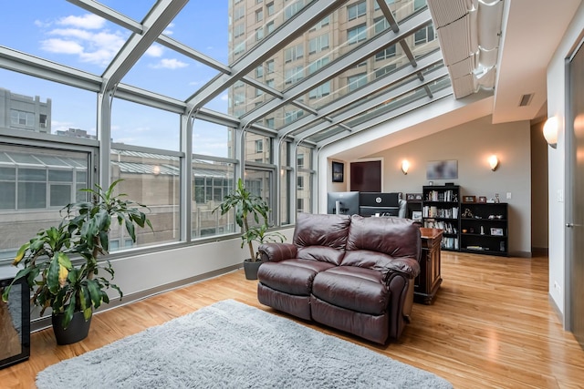 33 W Ontario St Unit Th5, Chicago, IL 60654 - living area featuring wood finished floors and a sunroom