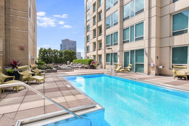 33 W Ontario St Unit Th5, Chicago, IL 60654 - community pool featuring a patio area