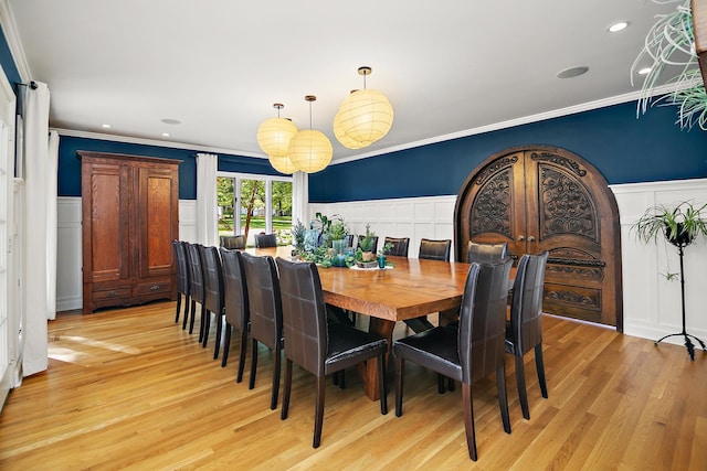 1444 Guildford Dr, Bourbonnais, IL 60914 - dining room featuring a decorative wall, crown molding, wainscoting, light wood finished floors, and recessed lighting