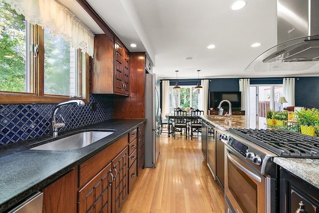 1444 Guildford Dr, Bourbonnais, IL 60914 - kitchen with appliances with stainless steel finishes, exhaust hood, recessed lighting, light wood-type flooring, and tasteful backsplash