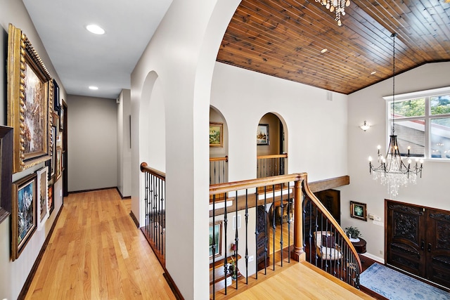 1444 Guildford Dr, Bourbonnais, IL 60914 - corridor featuring an upstairs landing, lofted ceiling, wood finished floors, a chandelier, and recessed lighting