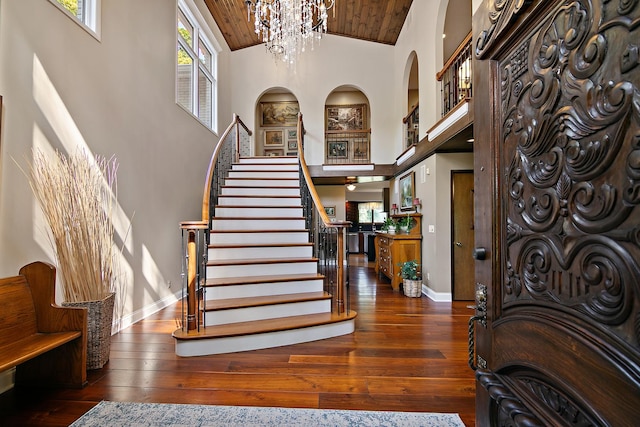 1444 Guildford Dr, Bourbonnais, IL 60914 - foyer with high vaulted ceiling, wood ceiling, a chandelier, stairway, and hardwood / wood-style floors