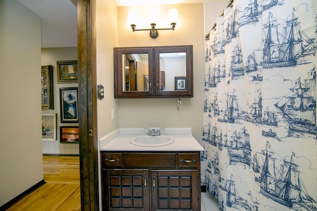 1444 Guildford Dr, Bourbonnais, IL 60914 - full bathroom with vanity and wood finished floors