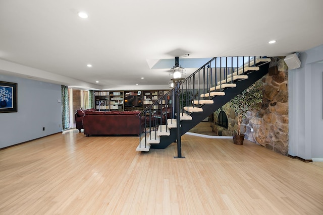 1444 Guildford Dr, Bourbonnais, IL 60914 - living area featuring stairs, wood finished floors, and recessed lighting