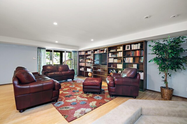 1444 Guildford Dr, Bourbonnais, IL 60914 - living area featuring wood finished floors and recessed lighting