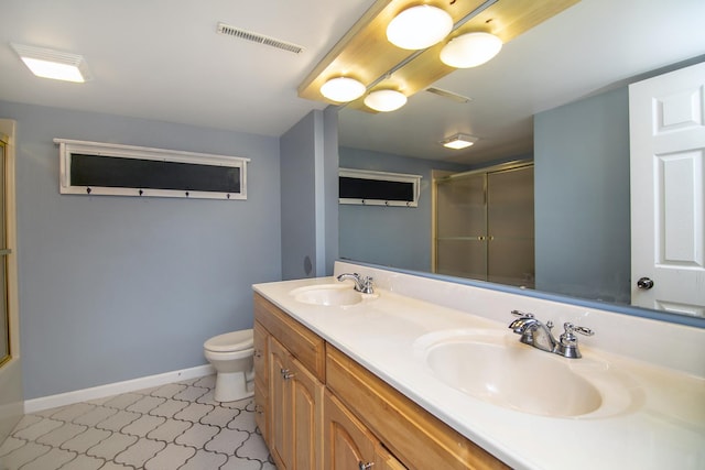 1444 Guildford Dr, Bourbonnais, IL 60914 - full bathroom featuring a shower with shower door and double vanity