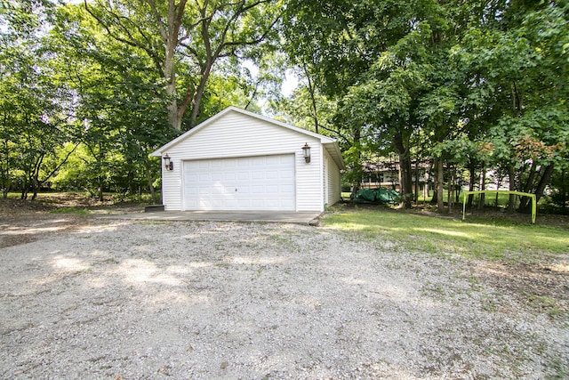 1444 Guildford Dr, Bourbonnais, IL 60914 - detached garage with view of wooded area