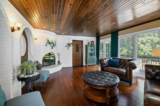 1444 Guildford Dr, Bourbonnais, IL 60914 - living area with brick wall, wooden ceiling, wood-type flooring, and recessed lighting