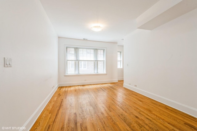 5412 N Kenmore Ave Unit 1W, Chicago, IL 60640 - empty room featuring light wood-type flooring and baseboards