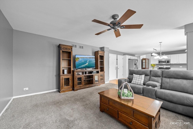 1918 Congrove Dr, Aurora, IL 60504 - living room with ceiling fan and light carpet