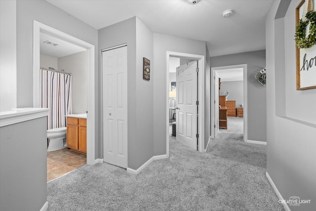 1918 Congrove Dr, Aurora, IL 60504 - hallway featuring light colored carpet and baseboards