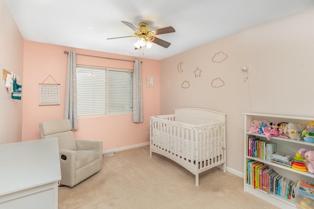 1704 Cascade Ridge Dr, Plainfield, IL 60586 - bedroom featuring a crib, light colored carpet, and a ceiling fan