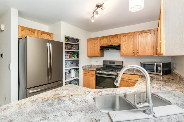 1704 Cascade Ridge Dr, Plainfield, IL 60586 - kitchen featuring appliances with stainless steel finishes, under cabinet range hood, and light stone counters