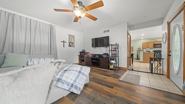 502 N Dixon Ave, Dixon, IL 61021 - living room featuring ceiling fan and light wood finished floors