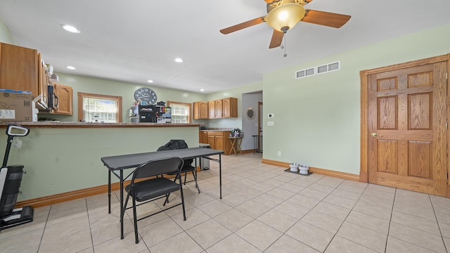 502 N Dixon Ave, Dixon, IL 61021 - dining space featuring light tile patterned flooring, a ceiling fan, and recessed lighting