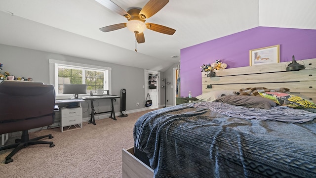 502 N Dixon Ave, Dixon, IL 61021 - carpeted bedroom with vaulted ceiling, an office area, and a ceiling fan