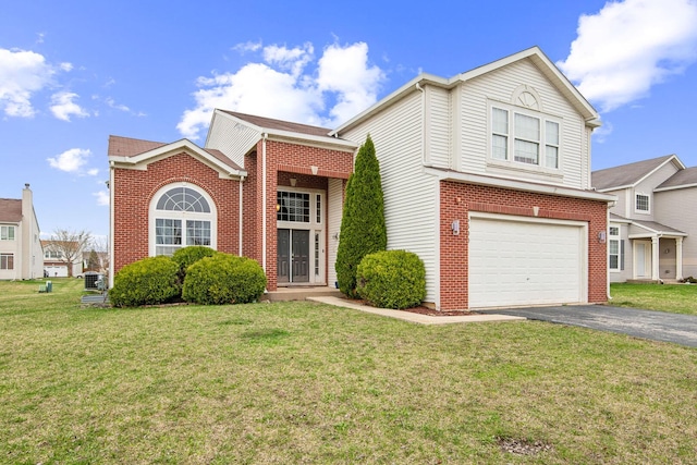 6500 Pasture Side Trl, Matteson, IL 60443 - traditional-style house featuring driveway, a garage, a front yard, and brick siding
