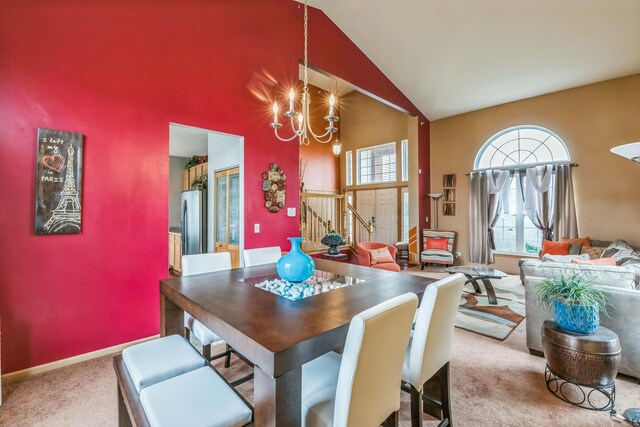 6500 Pasture Side Trl, Matteson, IL 60443 - dining area with carpet floors, high vaulted ceiling, and a chandelier