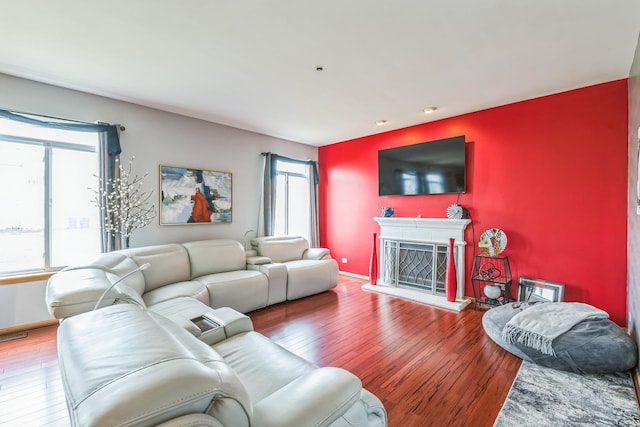 6500 Pasture Side Trl, Matteson, IL 60443 - living area with a fireplace with raised hearth and hardwood / wood-style floors