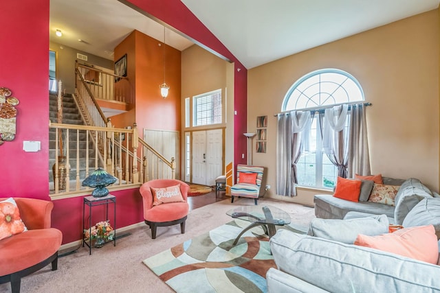 6500 Pasture Side Trl, Matteson, IL 60443 - living room featuring carpet, a towering ceiling, plenty of natural light, and stairway