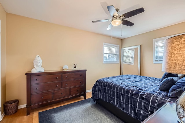 437 S Elmhurst Rd, Mount Prospect, IL 60056 - bedroom with multiple windows, light wood-type flooring, and a ceiling fan
