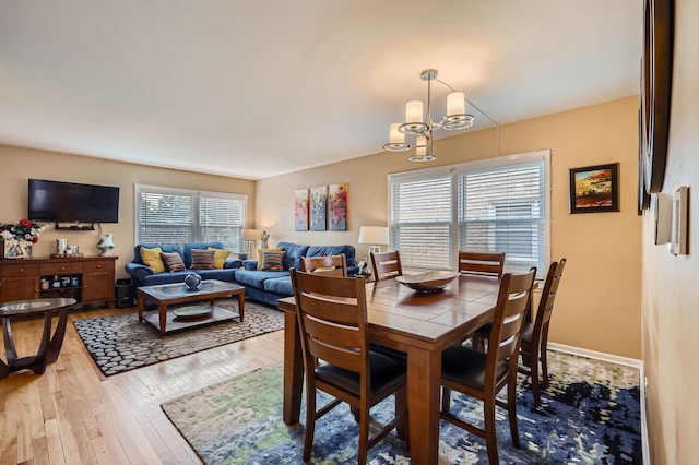 437 S Elmhurst Rd, Mount Prospect, IL 60056 - dining room with a chandelier and wood-type flooring