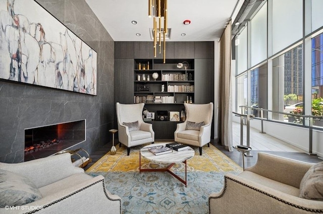 450 E Waterside Dr Unit 1606, Chicago, IL 60601 - living area featuring a premium fireplace, wood finished floors, built in features, and recessed lighting