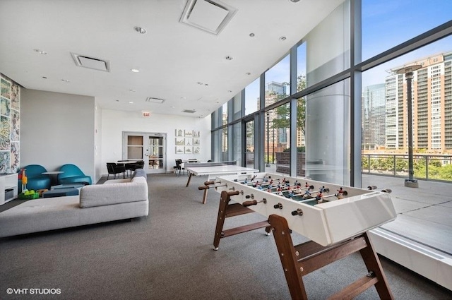 450 E Waterside Dr Unit 1606, Chicago, IL 60601 - recreation room with plenty of natural light, a high ceiling, carpet floors, expansive windows, and recessed lighting
