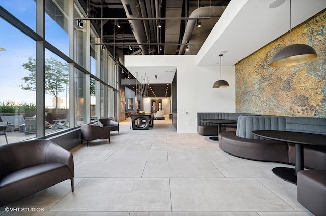 450 E Waterside Dr Unit 1606, Chicago, IL 60601 - community lobby featuring a high ceiling and floor to ceiling windows