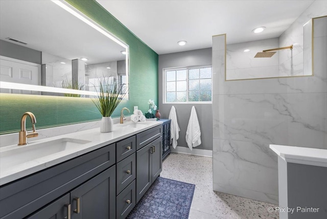 561 S Jade Ln Unit 1106, Round Lake, IL 60073 - full bath with double vanity, a marble finish shower, speckle patterned floor, and recessed lighting